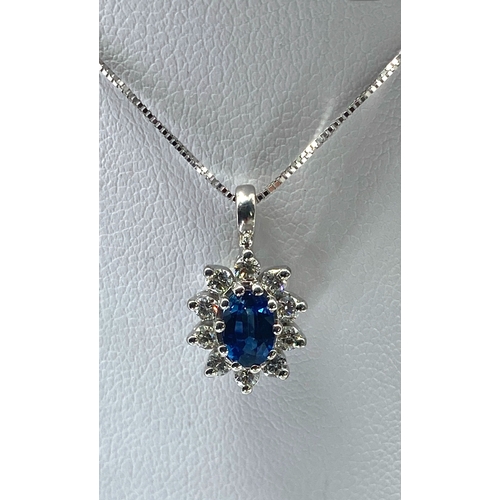 54 - An 18ct white gold diamond & sapphire pendant & chain, chain is 18 inches long approx, pendant is 17... 