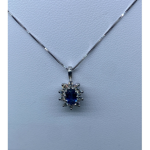 54 - An 18ct white gold diamond & sapphire pendant & chain, chain is 18 inches long approx, pendant is 17... 