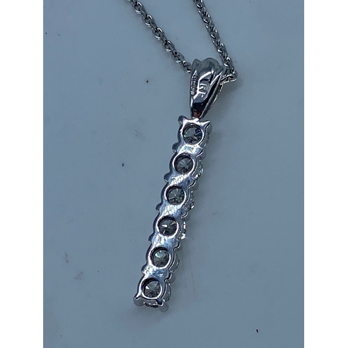 64 - An 18ct white gold diamond drop pendant & chain, pendant is set with 6 round brilliant cut diamonds,... 