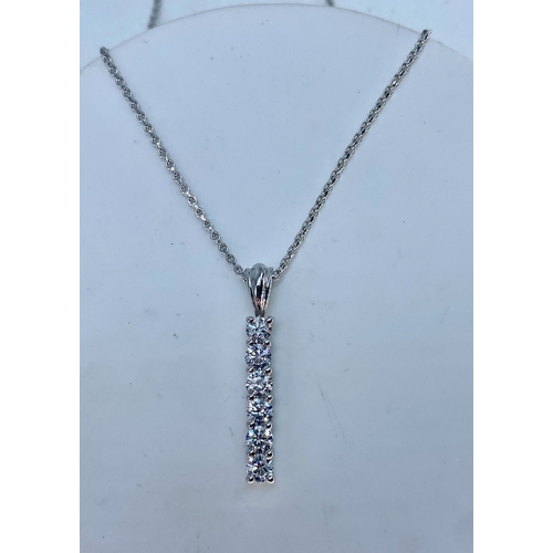 64 - An 18ct white gold diamond drop pendant & chain, pendant is set with 6 round brilliant cut diamonds,... 