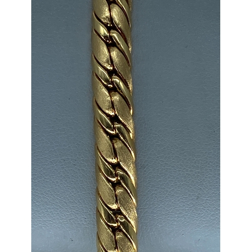 67 - An 18ct yellow gold fancy link bracelet, fully hallmarked, 7 1/2 inches long, 32.4 grams in weight a... 