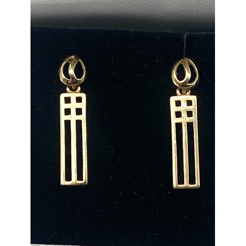 73 - A pair of 9ct yellow gold Scottish design earrings, 26mm drop x 5mm, 2.1 grams in weight approx