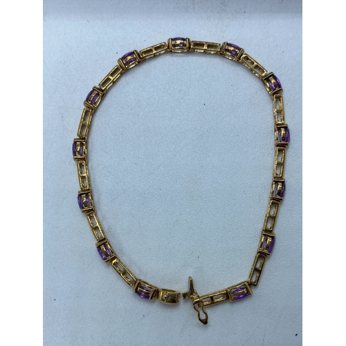 8 - A 9ct yellow gold amethyst stone set dress bracelet, 6 grams in weight, 7 1/2 inches long approx, se... 