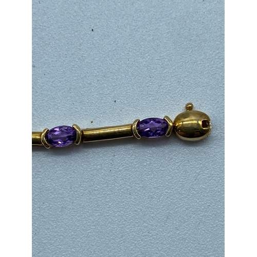 8 - A 9ct yellow gold amethyst stone set dress bracelet, 6 grams in weight, 7 1/2 inches long approx, se... 