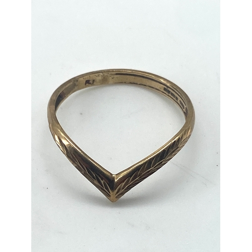 80 - A 9ct yellow gold wishbone ring, size R, 1.5 grams in weight approx