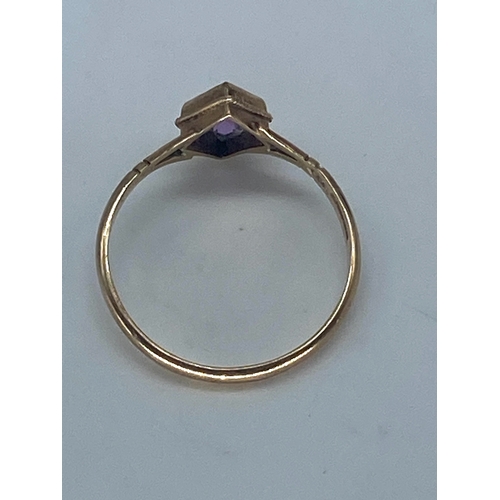 82 - A 9ct yellow gold amethyst dress ring, amethyst is a very nice triangle cut stone, fully hallmarked,... 