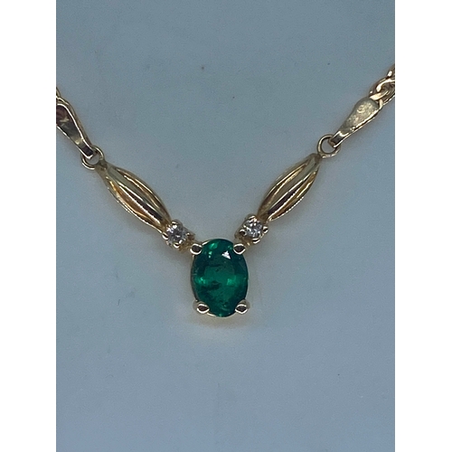 88 - A 14ct yellow gold emerald & diamond necklace, 16 inches long, set with lovely oval cut emeralds wit... 