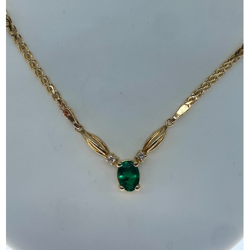 88 - A 14ct yellow gold emerald & diamond necklace, 16 inches long, set with lovely oval cut emeralds wit... 