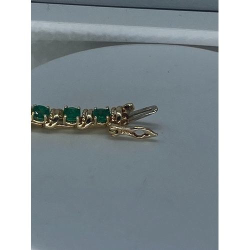 94 - A 14ct yellow gold emerald set bracelet, approx 6.50ct emeralds, 12.6 grams approx weight, 7 inches ... 