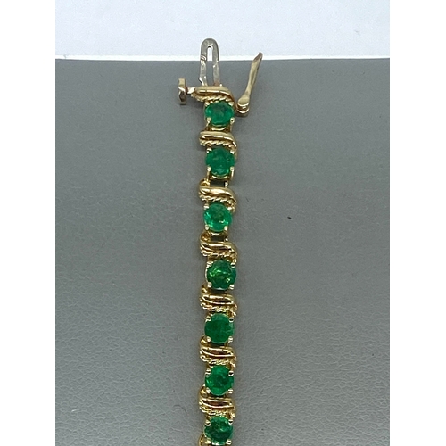 94 - A 14ct yellow gold emerald set bracelet, approx 6.50ct emeralds, 12.6 grams approx weight, 7 inches ... 