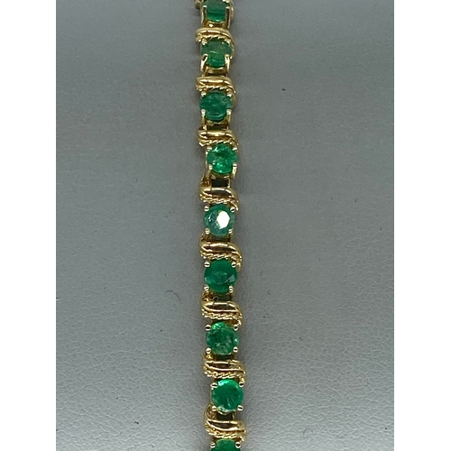 94 - A 14ct yellow gold emerald set bracelet, approx 6.50ct emeralds, 12.6 grams approx weight, 7 inches ... 