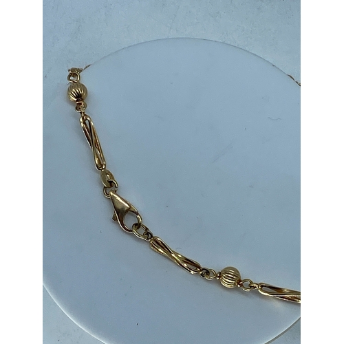 96 - A 9ct yellow gold ball & knot necklace, fully hallmarked, 16 inches long approx, 10.8 grams in weigh... 