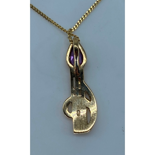 105 - A 9ct yellow gold amethyst pendant & chain, Scottish design on the pendant, weight is 2 grams approx... 