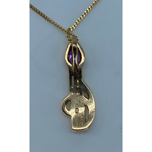 105 - A 9ct yellow gold amethyst pendant & chain, Scottish design on the pendant, weight is 2 grams approx... 