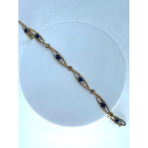 122 - A 9ct yellow gold sapphire & diamond bracelet, 7 1/2 inches long, 5.5 grams approx weight