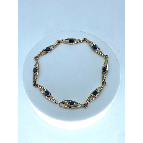 122 - A 9ct yellow gold sapphire & diamond bracelet, 7 1/2 inches long, 5.5 grams approx weight