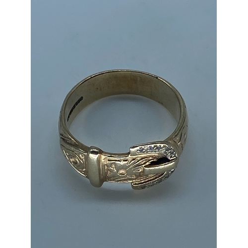 126 - A 9ct yellow gold diamond stone set buckle ring, nice solid thick shank, size R (leading edge), weig... 