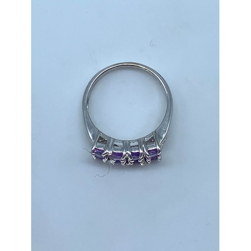 128 - A 9ct white gold amethyst dress ring, weight is 3.4 grams approx, size N