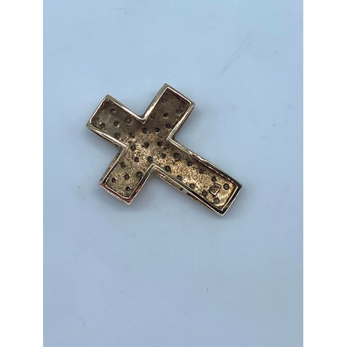 134 - A 9ct yellow gold diamond set cross pendant no chain, size is 24mm x 18mm, weight is 1.9 grams appro... 