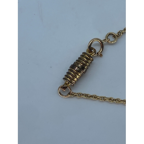 138 - A 9ct yellow gold turquoise & seed pearl pendant & chain, chain is 16 inches long, there is a metal ... 