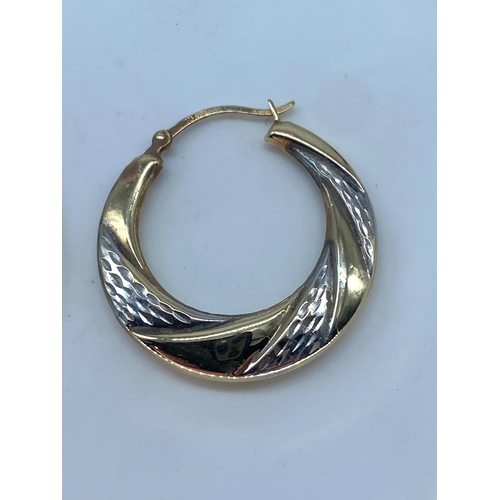 144 - A pair of 9ct white & yellow gold hooped earrings, weight is 1.4 grams approx, 24mm size,