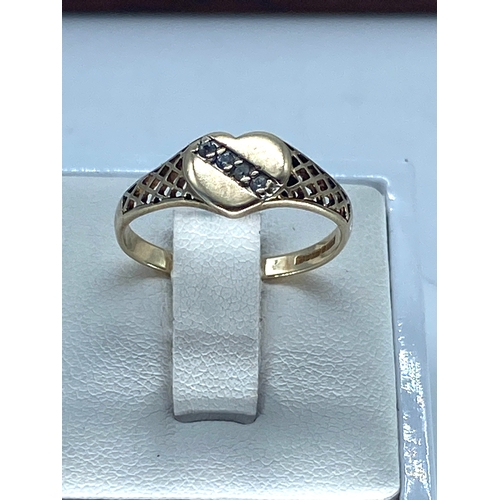 149 - A 9ct yellow gold dress cz stone set heart ring, size N, 1.9 grams approx weight