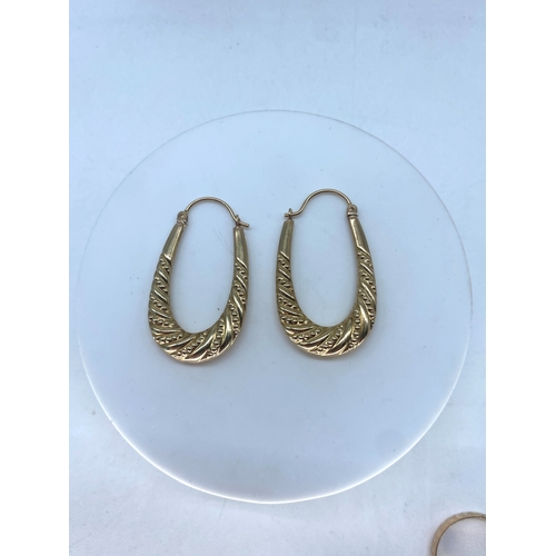 157 - A pair of 9ct yellow gold hoop earrings, 1.6 grams in weight approx, 32mm x 18mm