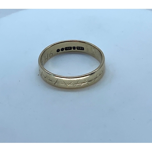 158 - A 9ct yellow gold wedding band, size M,  diamond cut design, 2.3 grams approx weight, solid band