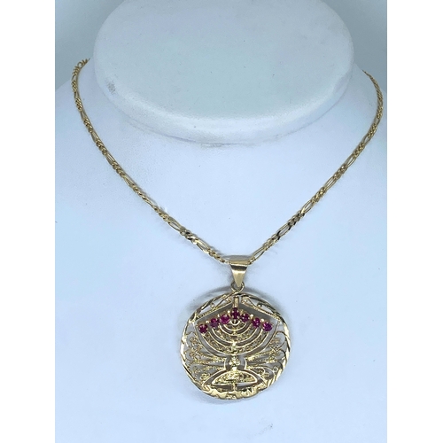 204 - A 14ct yellow gold pendant & chain, chain is a figaro chain, 19 inches long, pendant is 40mm x 28mm,... 