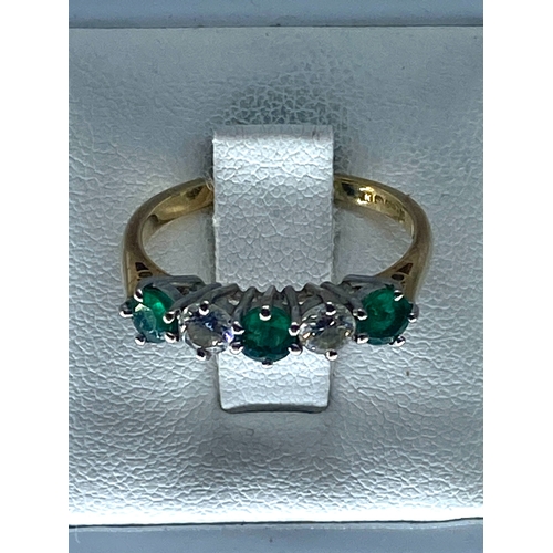 211 - An 18ct yellow gold emerald & diamond 5 stone eternity band, size O, 3 grams in weight approx