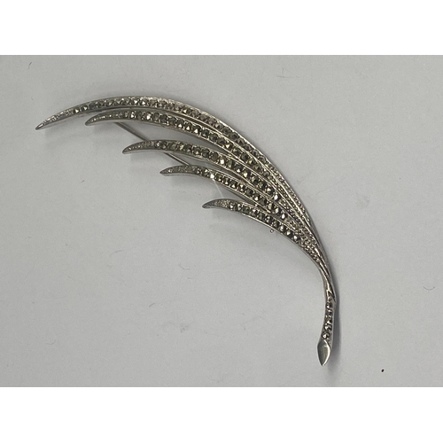 281 - A silver marcasite leaf brooch, hallmarked 935, 85 mm long, set with marcasite stones