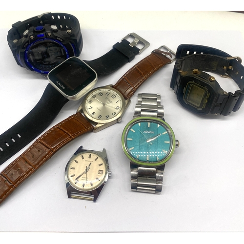 295 - A collection of digital watches, including a vintage Casio