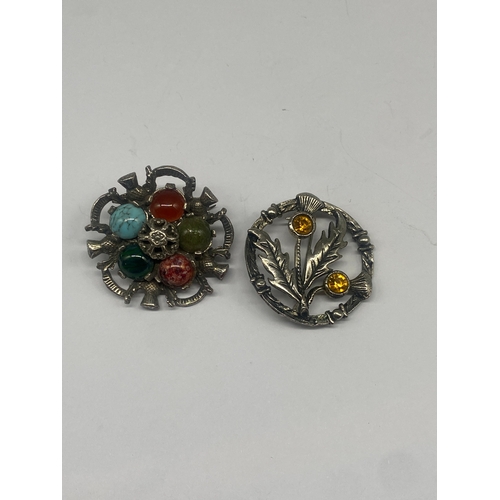 310 - 2x Scottish costume jewellery brooches, one is made by Miracle, other is a white metal