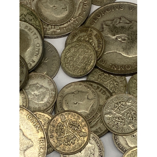 312 - A mixed lot of silver coins, 260 grams approx weight, some of the coins are pre 1940s, mixed silver ... 