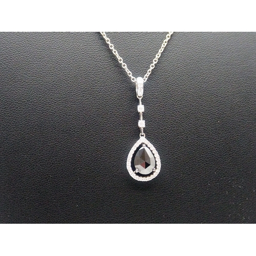 235 - An 18ct White Gold Pear Shape Black Diamond Pendant, 18ct Chain is 16 inches long, Black Diamond 1.2... 