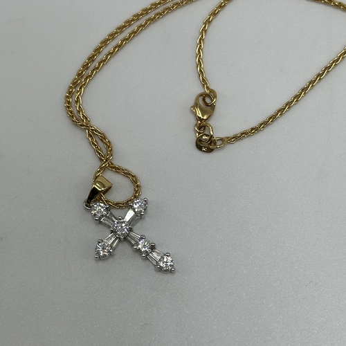 229 - An 18ct yellow gold cross pendant & chain, cross is white gold with diamonds, approx 0.50ct diamond,... 