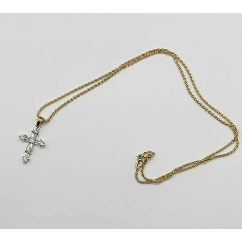 229 - An 18ct yellow gold cross pendant & chain, cross is white gold with diamonds, approx 0.50ct diamond,... 