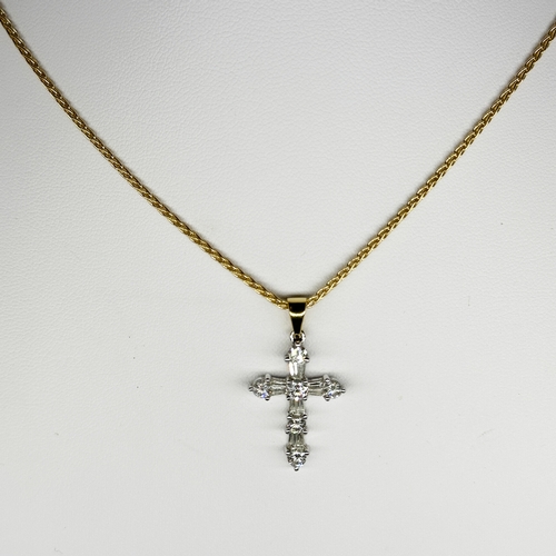 229 - An 18ct yellow gold cross pendant & chain, cross is white gold with diamonds, approx 0.50ct diamond,... 