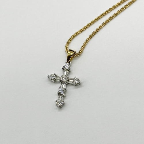 229 - An 18ct yellow gold cross pendant & chain, cross is white gold with diamonds, approx 0.50ct diamond,... 