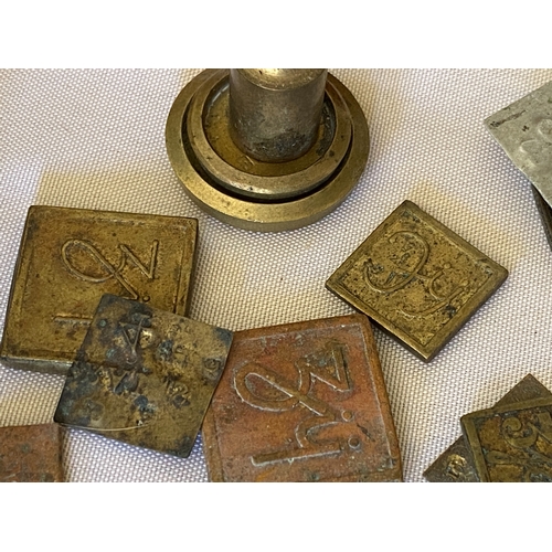 121 - A collection of postal stamp weights