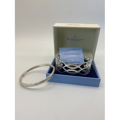 325 - A Newbridge silverware open cuff bangle with a box & a vintage silver bangle
