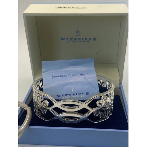 325 - A Newbridge silverware open cuff bangle with a box & a vintage silver bangle