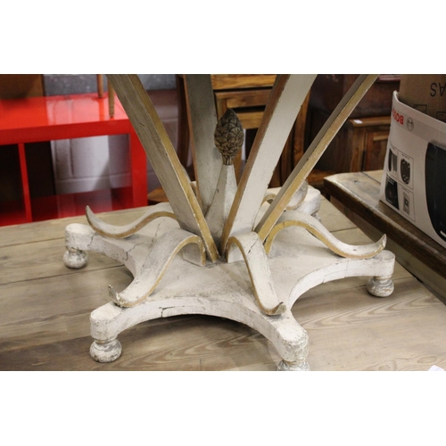 161 - A circular dining table with polished hardwood top and decorative painted base.