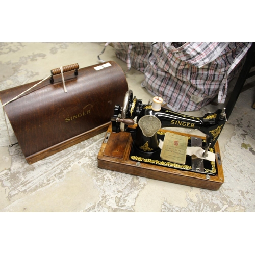 176 - A sewing machine and a typewriter.