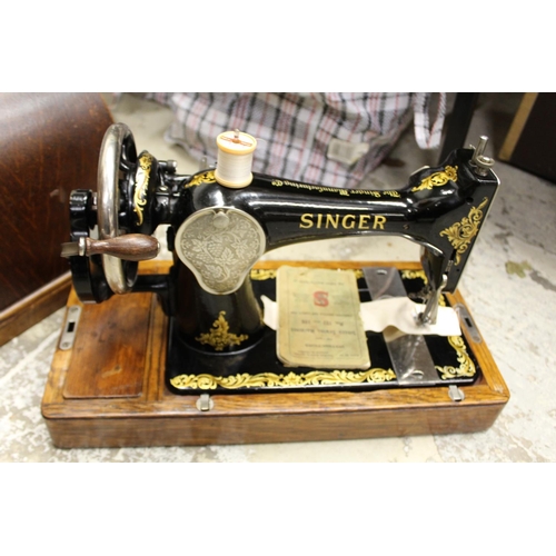 176 - A sewing machine and a typewriter.