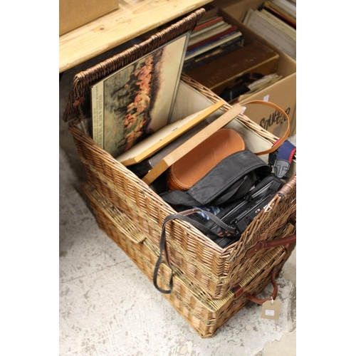 178 - Two wicker hampers containing miscellaneous collectables to include binoculars etc.