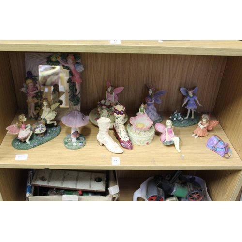 18 - Decorative resin models of fairies and similar items.