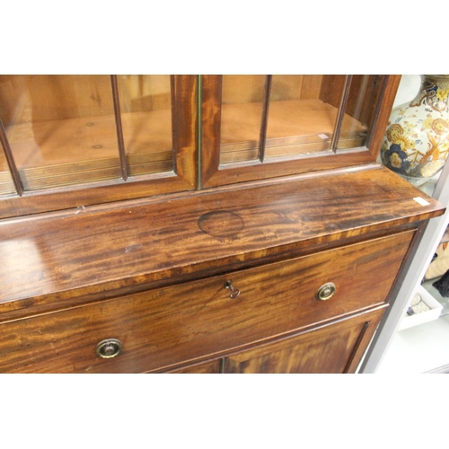 196 - A George III mahogany secretaire bookcase.