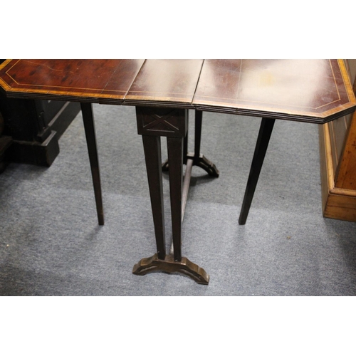 201 - An Edwardian inlaid mahogany Sutherland table.