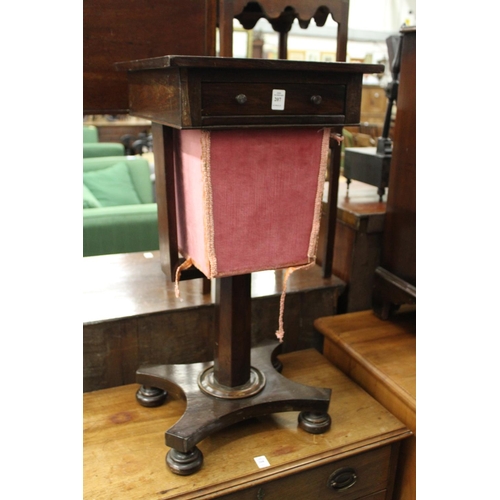 207 - A 19th century rosewood work table.